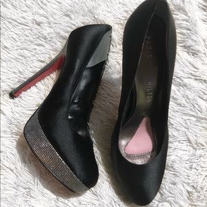 black satin stilettos with sparkling bottoms